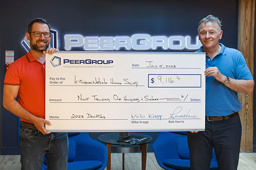 PEER Group presents donation cheque to KW Humane Society